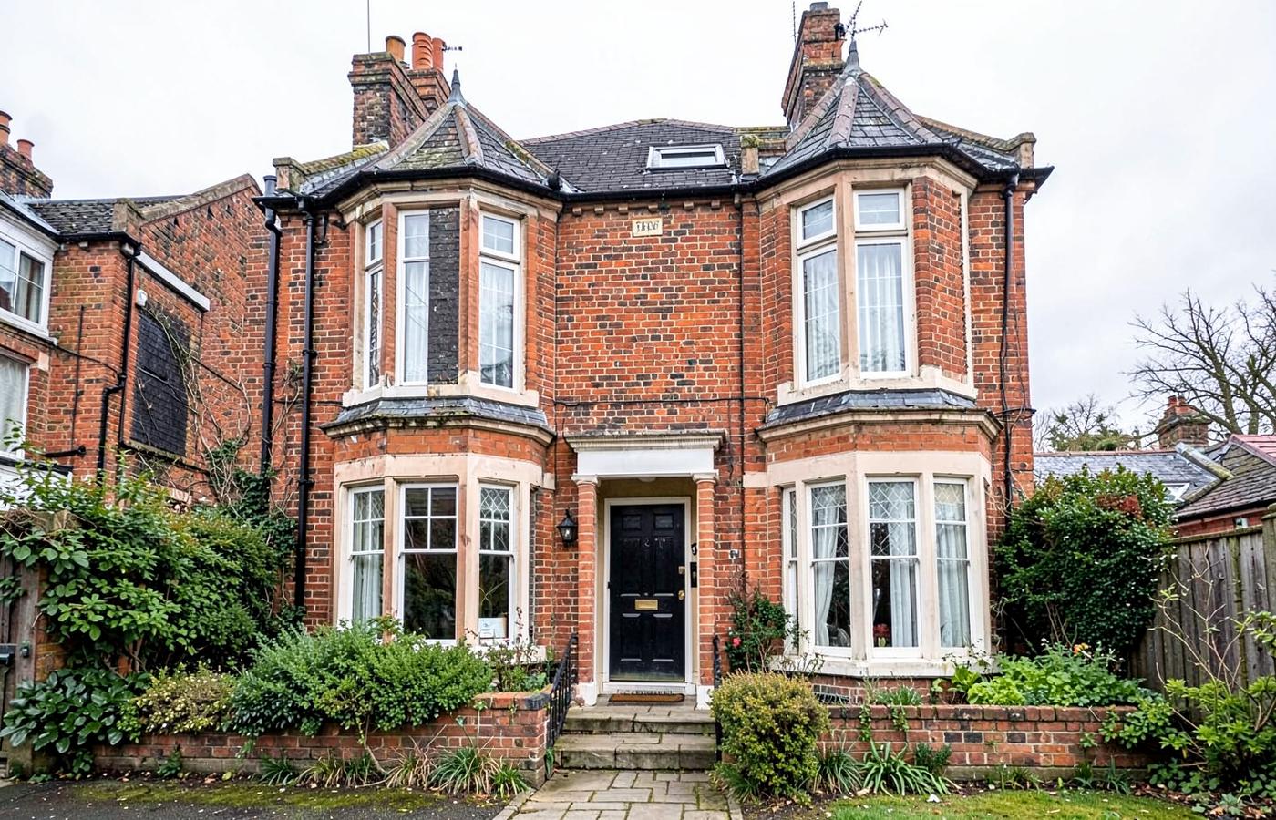 Red-brick terraced student house exterior